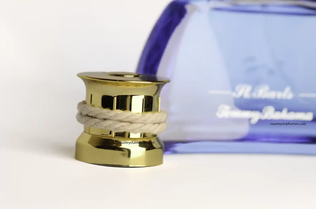 St. Bart's cologne bottle next to gold cap